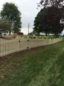 Vinyl fence installation in Fort Wayne, Indiana, tan picket style.