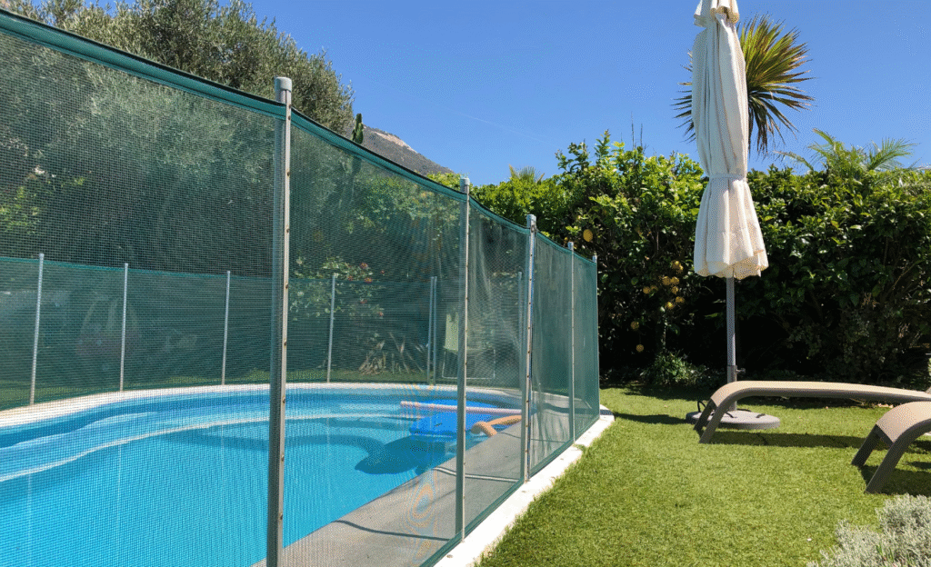 Meeting safety standards pool fence