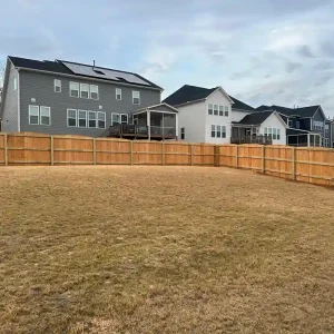 arched privacy wood fence with dog-eared pickets in raleigh
