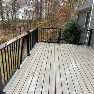 Gray Composite Deck with Black Metal Railings Raleigh