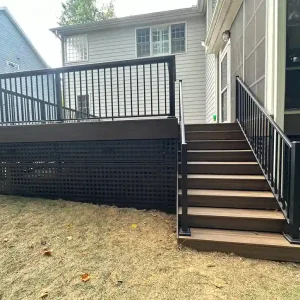 Raised Composite Deck with Black Metal Railings and Lattice Skirting Raleigh