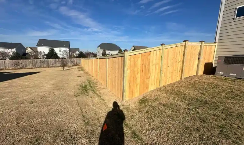 Step-Down Privacy Wood Fence for Sloped Terrain Raleigh