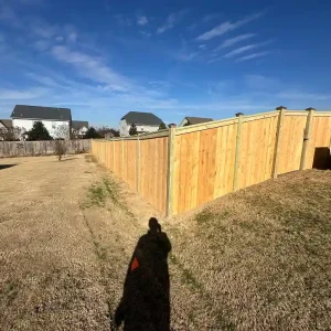 Step-Down Privacy Wood Fence for Sloped Terrain Raleigh